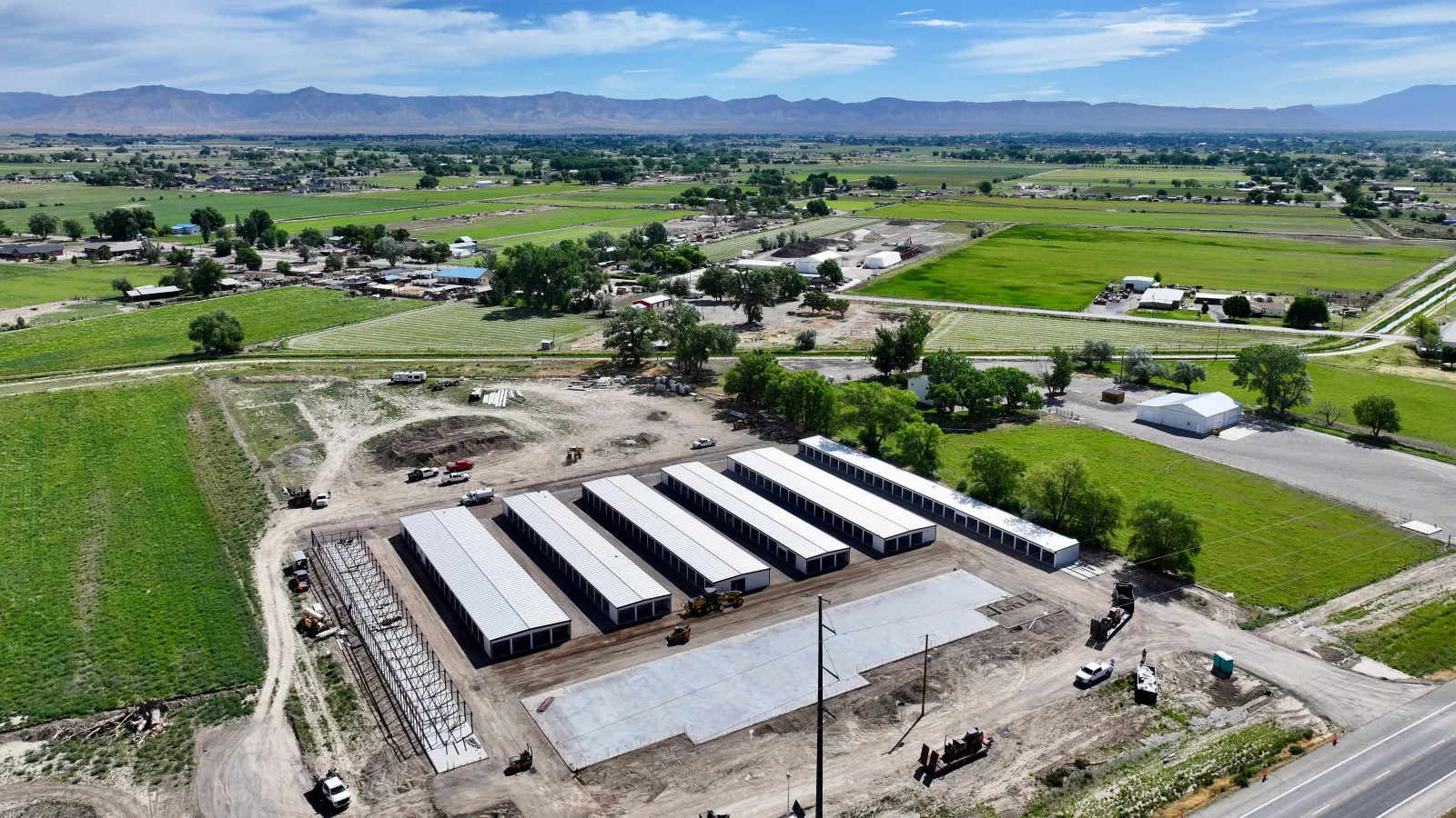 Wide aerial of My Storage Fruita drive-up storage rows across the Grand Valley, Fruita Colorado