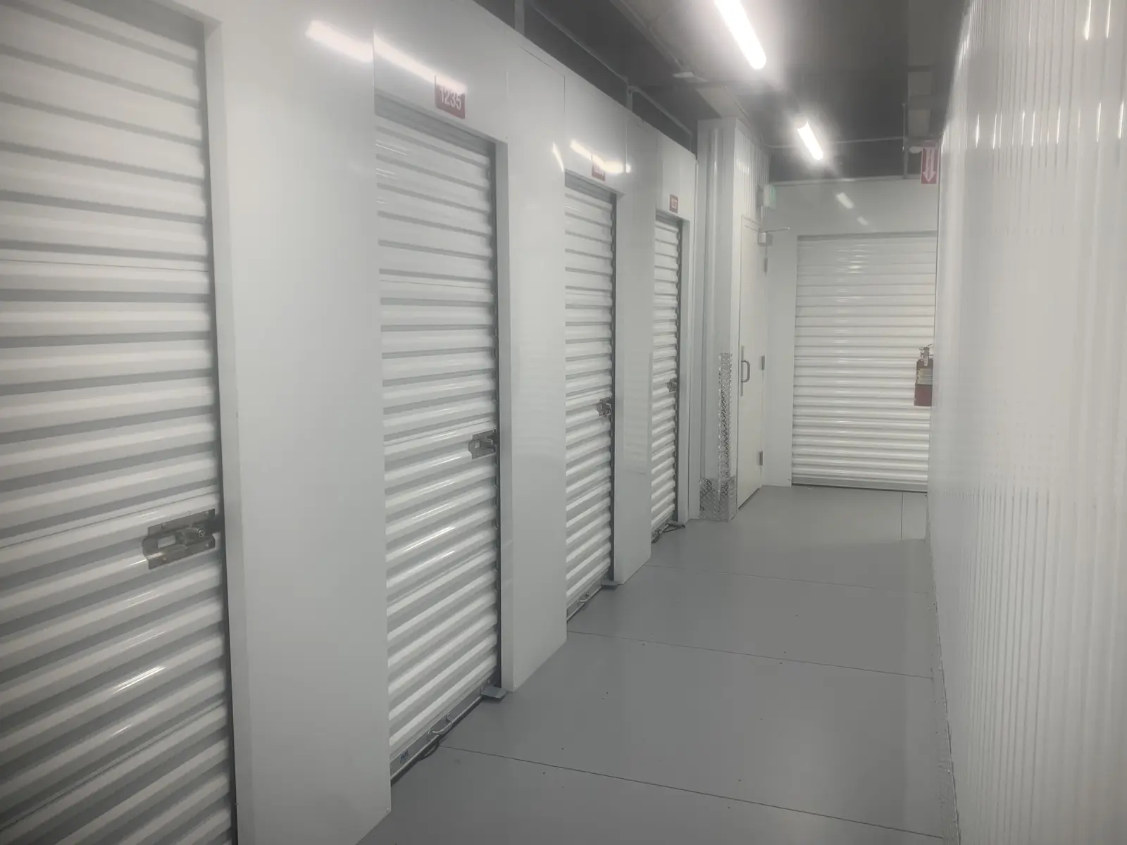 Climate-controlled self-storage corridor inside a Wasatch Structures metal building, Midvale Utah