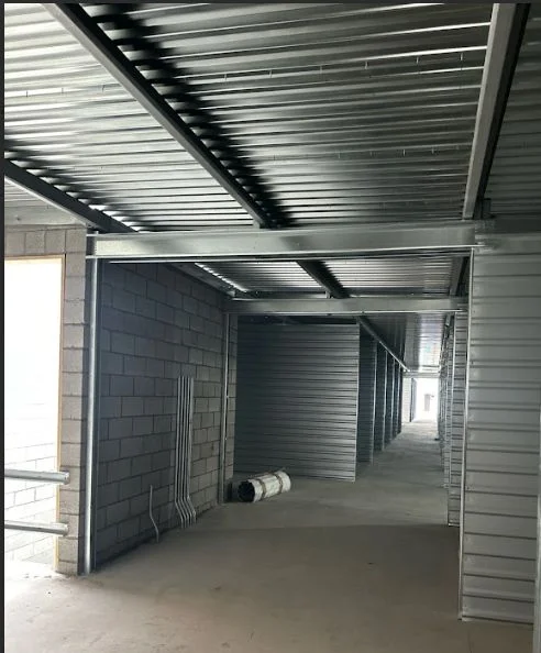 Interior steel framing and floor decking inside Timp Hwy Self Storage under construction, Lehi Utah
