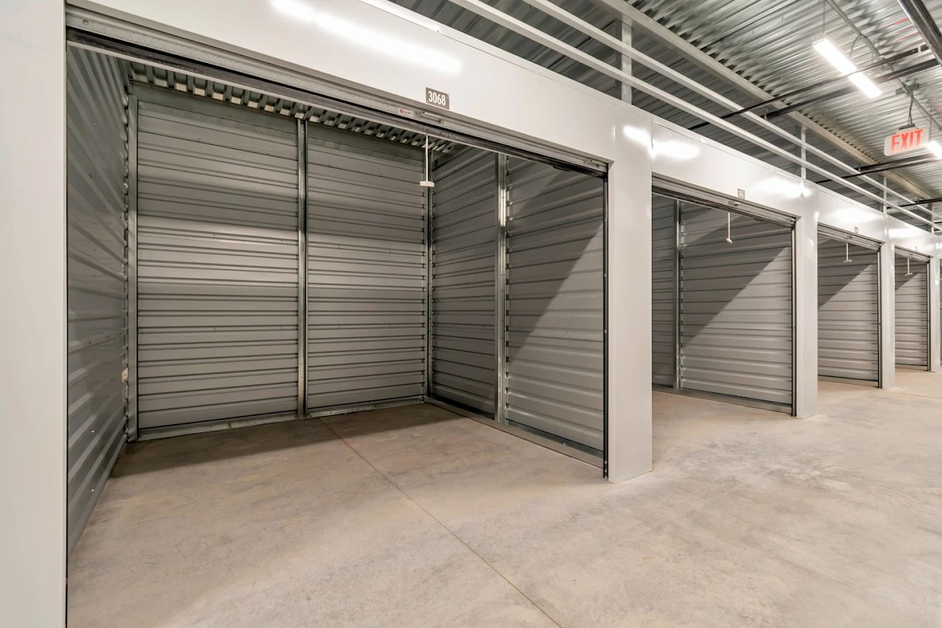 Large climate-controlled drive-up storage unit with the door open inside Timp Hwy Self Storage, Lehi Utah